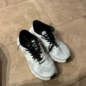 On Running White and Black Sneakers